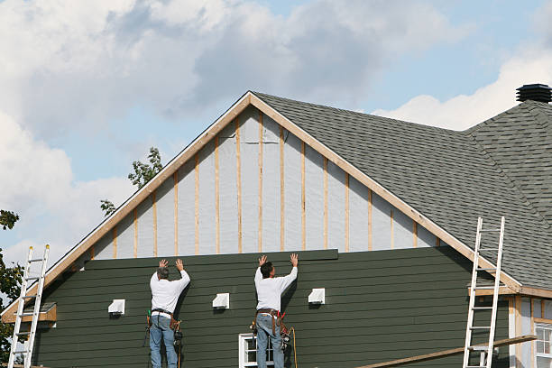 Professional Vinyl Siding technician working in Lowell, NC
